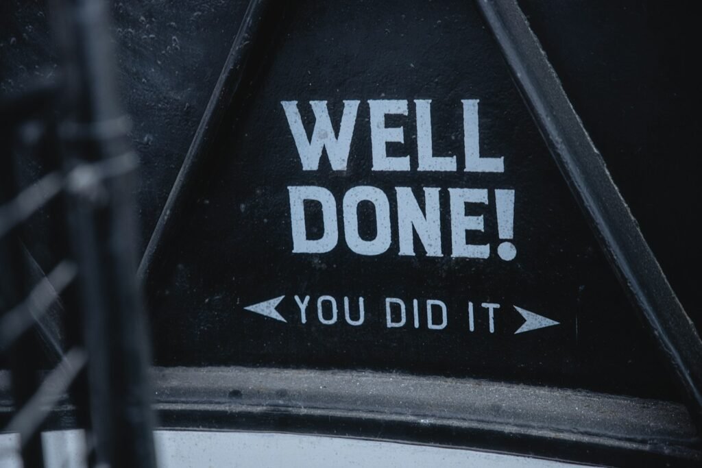 a sign that says well done you did it